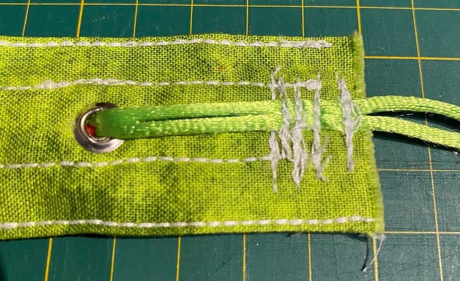 fixation verso cordon pour bouton, back cord attachment for button